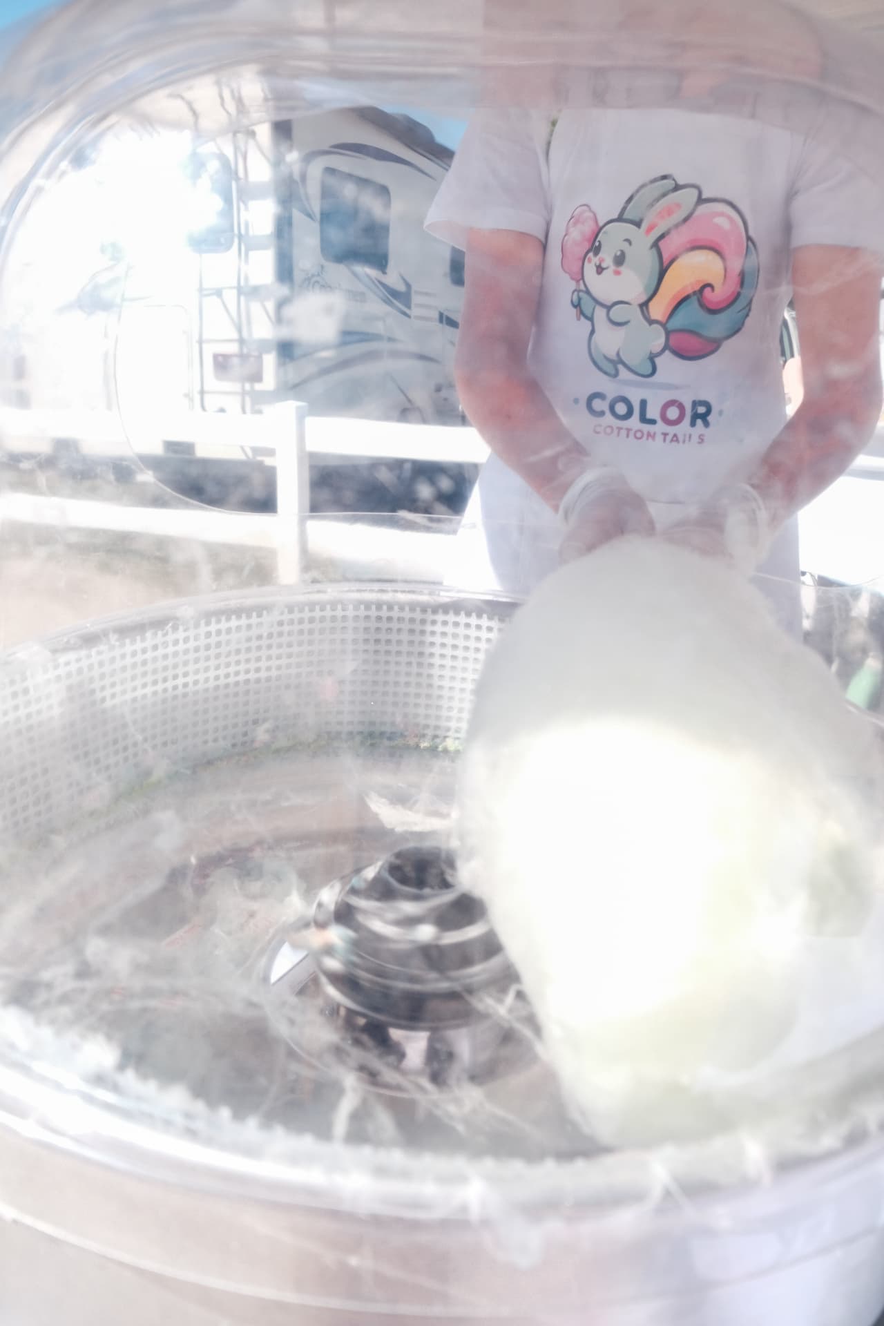Cotton candy being spun inside the machine